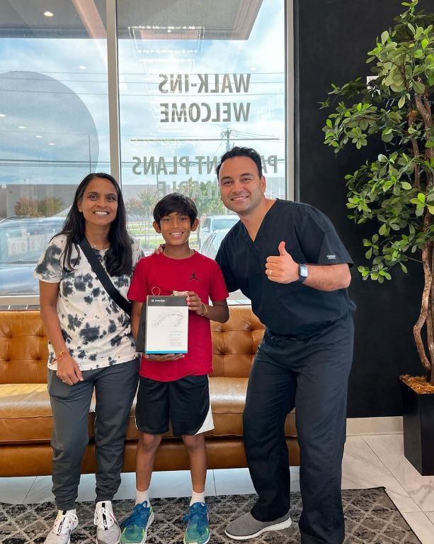 Dr. Baharvand with smiling patient at Inspire Dental Mesquite TX